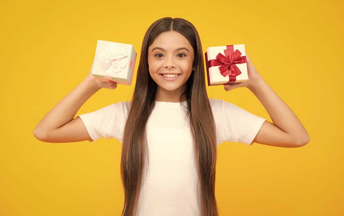 Teen celebrating a chore reward with presents